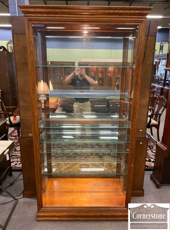 Howard Miller Tall Locking Oak Display Curio Cabinet Baltimore